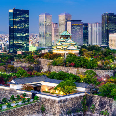 Osaka, Japan - November 20, 2015: Overlooking Osaka Castle Park at dusk. The castle dates from 1583 and the most recent reconstruction was completed in 1997.